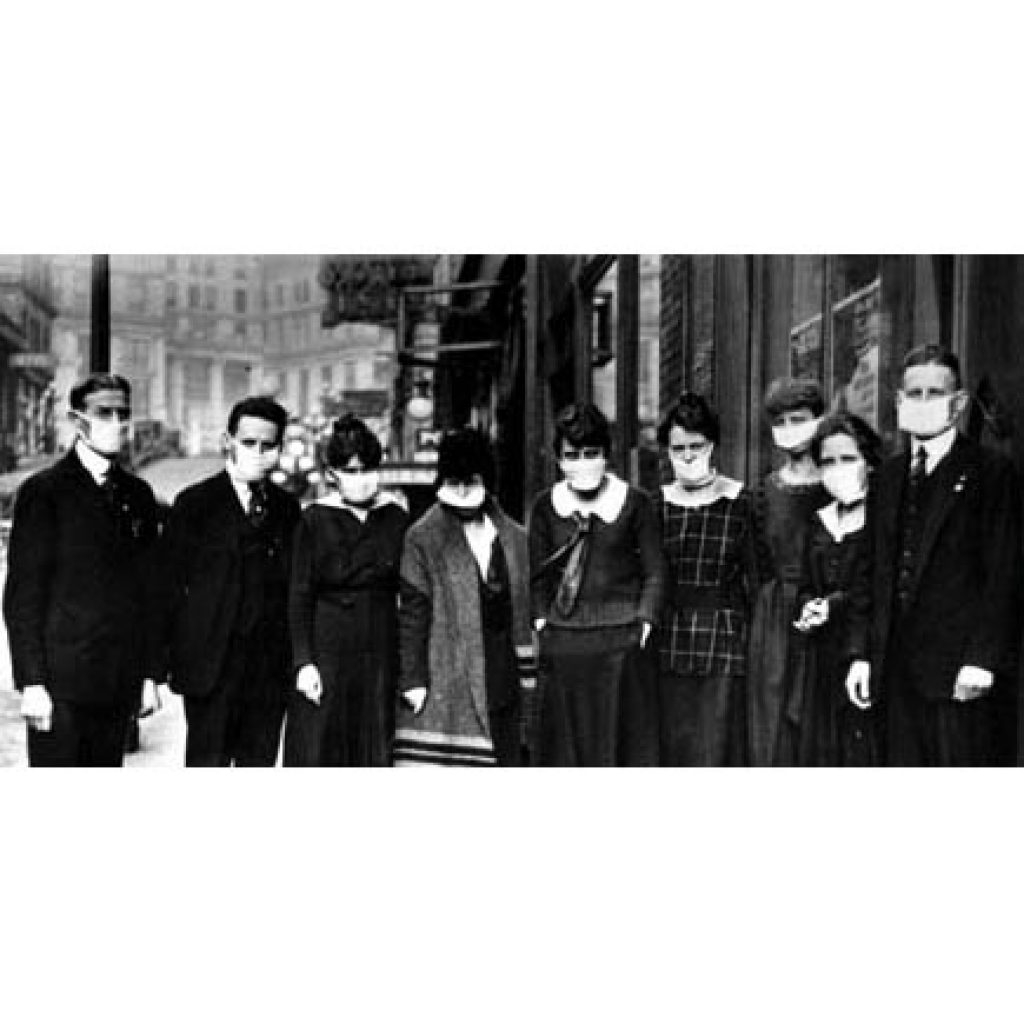 A group of people posing for the camera

Description automatically generated